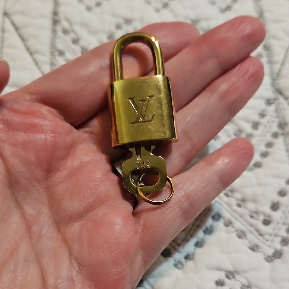 Louis Vuitton Luxurious Gold Padlock and Key